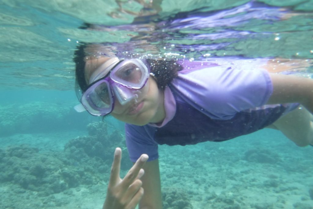 Girl scubadiving underwater